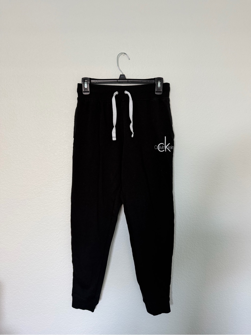 4 pairs of Calvin Klein joggers